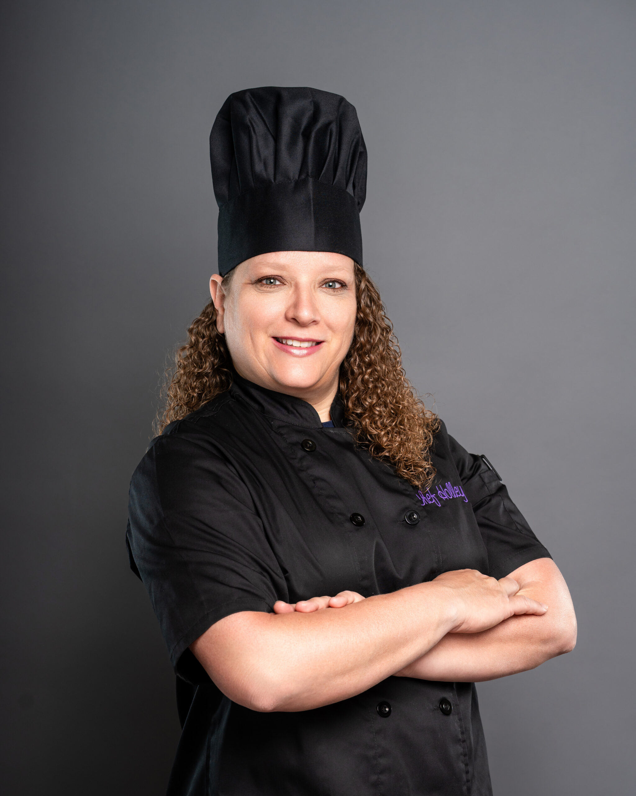 chef in black chef outfit