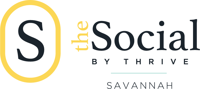 Logo for "The Social by Thrive" in Savannah, featuring a large "S" in a yellow oval, with text in black and yellow fonts, representing Thrive Senior Living's vibrant community spirit.