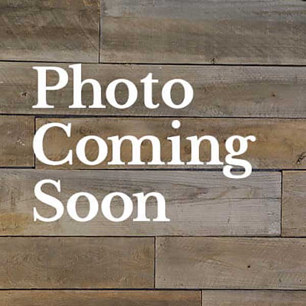 Text "Photo Coming Soon" over a background of horizontal wooden planks in various shades of brown and gray, reflecting the inviting atmosphere at Thrive Senior Living.